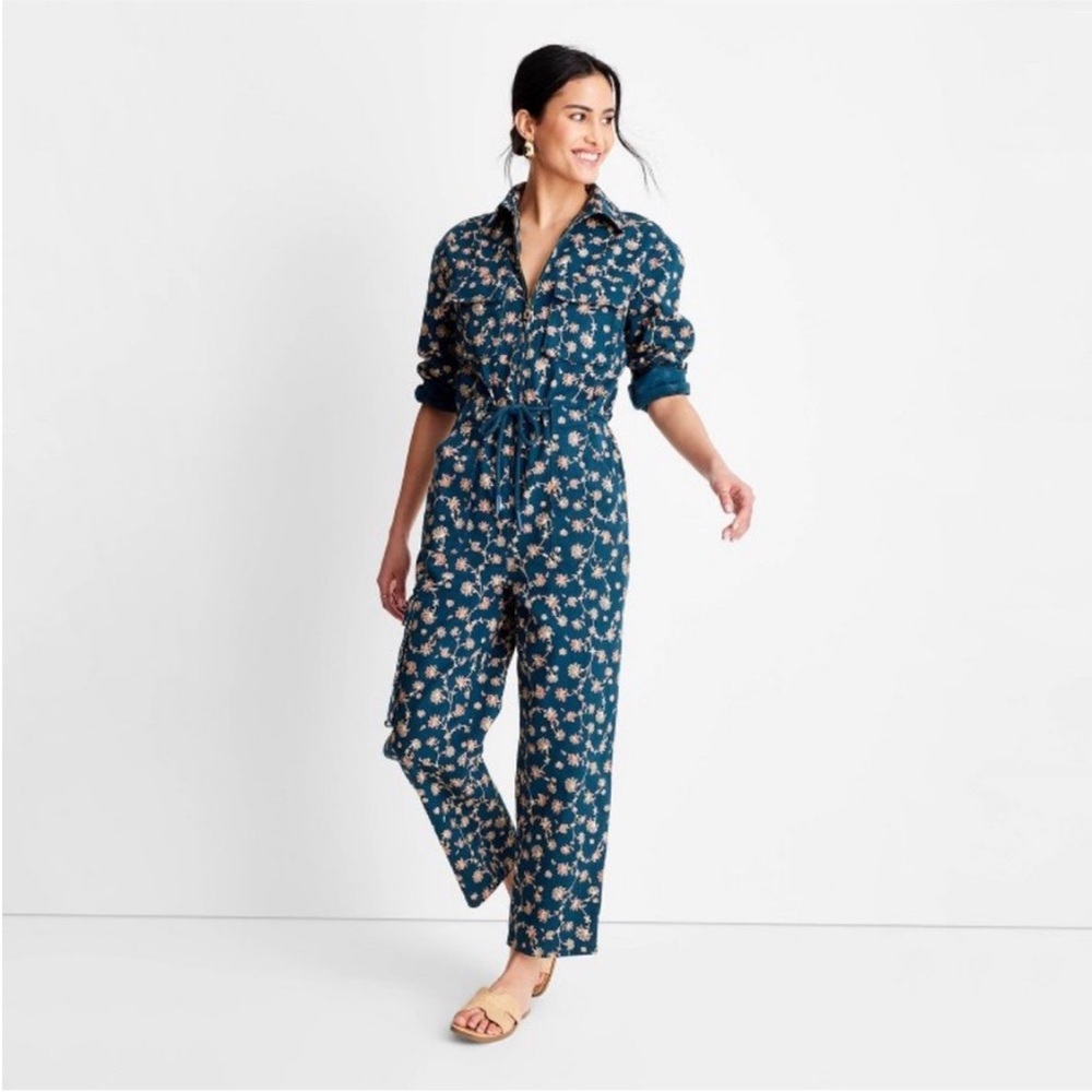 Women’s floral print long sleeve zip front boiler suit.